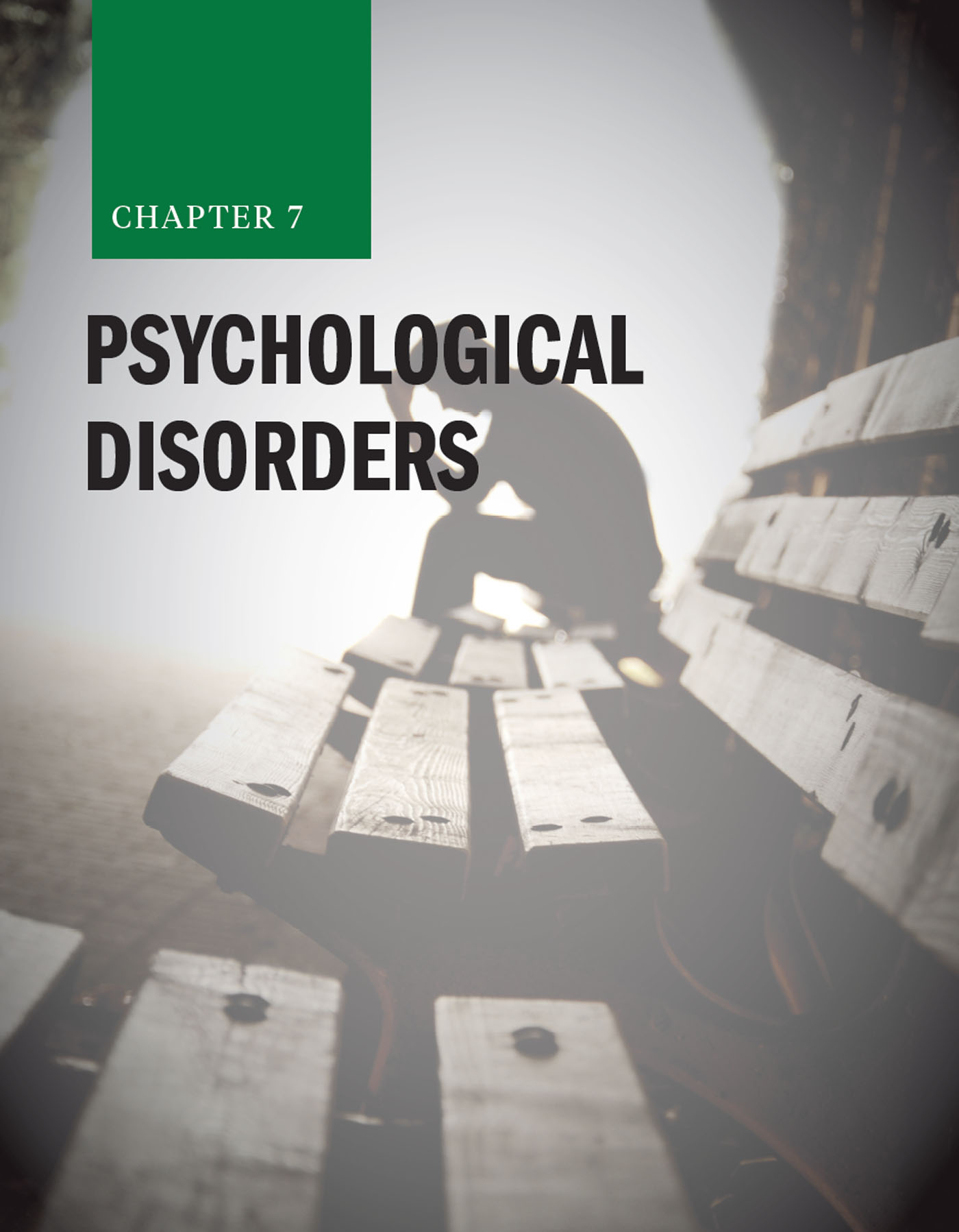 Chapter 7: Psychological Disorders with a pensive man sitting on a bench in the background