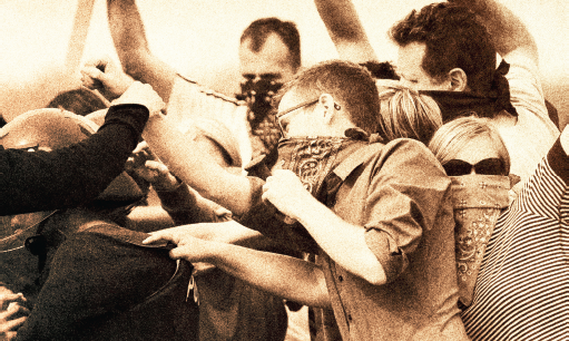 individuals with scarves covering faces